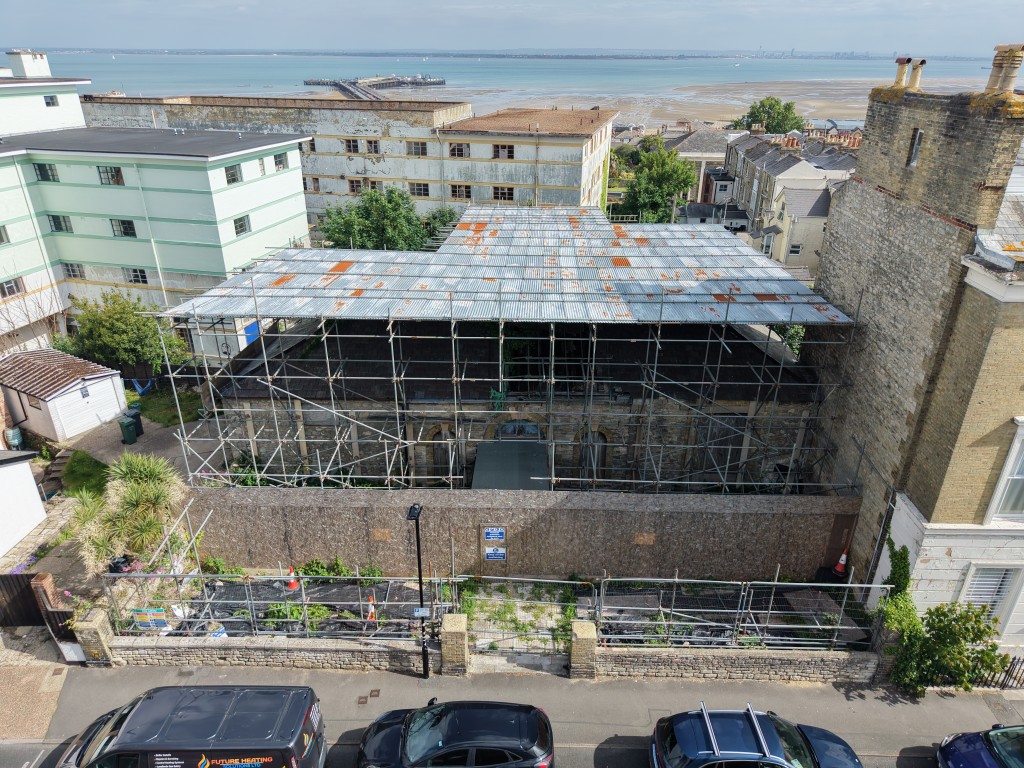 Lot: 121 - FREEHOLD TOWN CENTRE FORMER FREE SCHOOL AND COMMUNITY HALL WITH POTENTIAL - Looking North Over The Hall with The Pier and Solent Behind